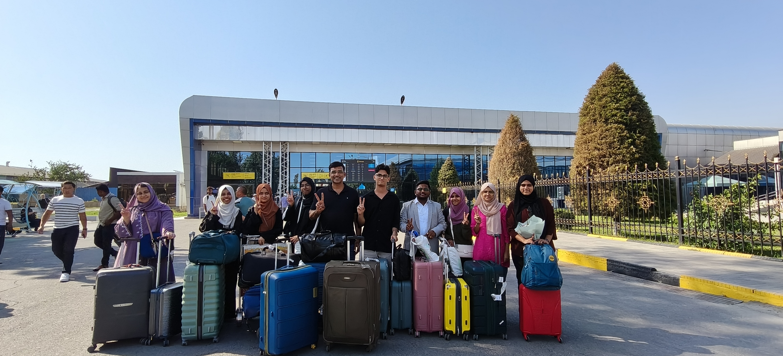 Stellar students and mentors arriving at the airport with their luggage